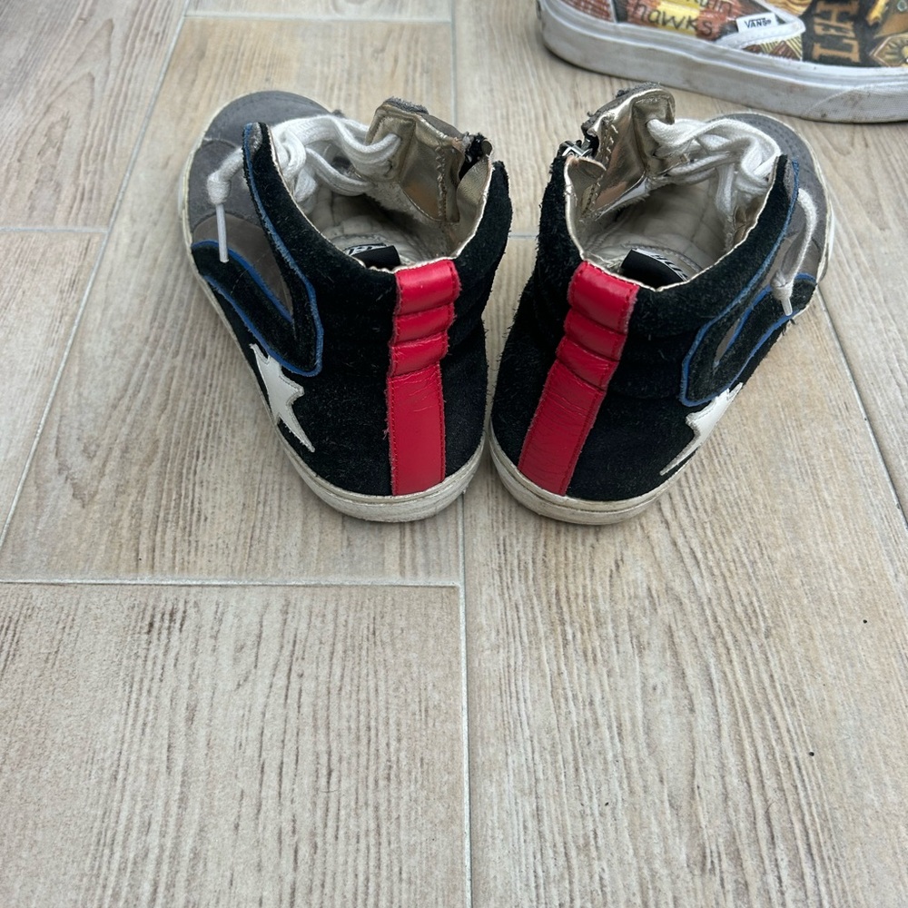 Golden Goose Women’s  Black Suede High-Top Sneakers with Red Heel Stripe
